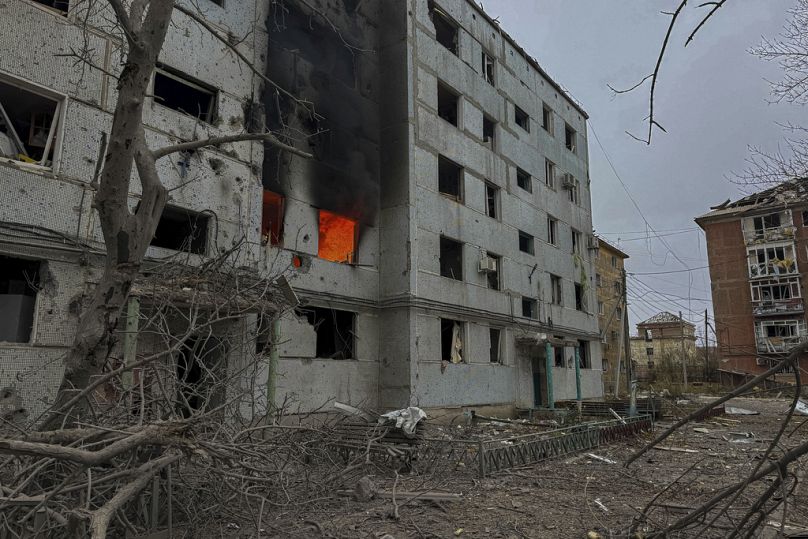 A multi-story building burns after a Russian strike on a residential neighbourhood in Kurakhove, Donetsk region, Ukraine, on Nov. 7, 2024. (AP Photo/Anton Shtuka)