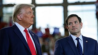 Republican presidential nominee former President Donald Trump speaks with Sen. Marco Rubio, R-Fla., during a campaign rally at J.S. Dorton Arena, Monday, Nov. 4, 2024.