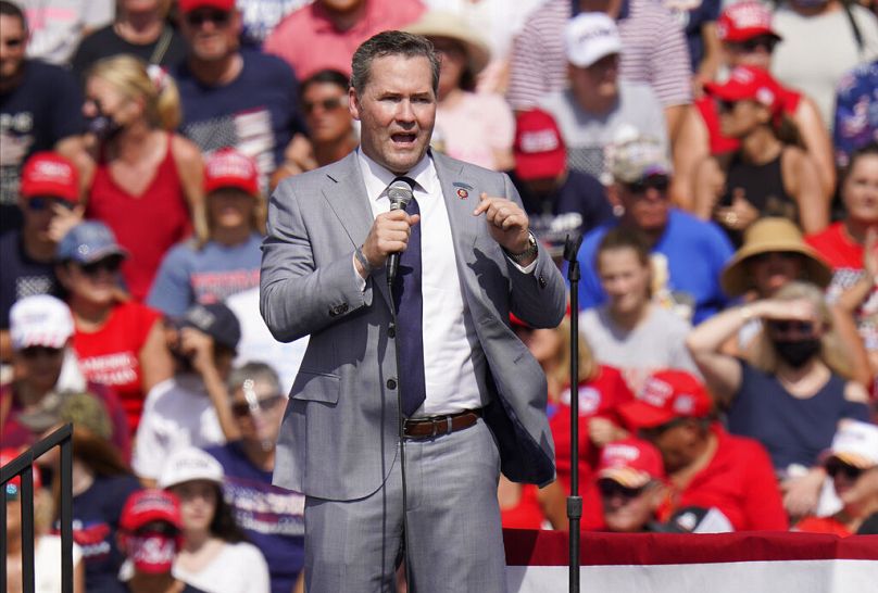 U.S. Rep Mike Waltz, R-Fla., speaks before President Donald Trump, and First Lady Melania Trump during a campaign rally Thursday, Oct. 29, 2020, in Tampa, Fla.