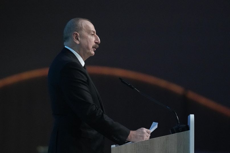 Ilham Aliyev, presidente dell'Azerbaigian, parla durante una sessione plenaria del vertice sul clima delle Nazioni unite Cop29, 12 novembre 2024, Baku, Azerbaigian