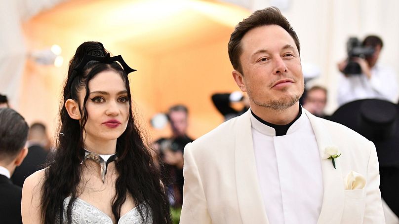 Grimes, left, and Elon Musk attend The Metropolitan Museum of Art's Costume Institute benefit gala in New York on 7 May 2018. 