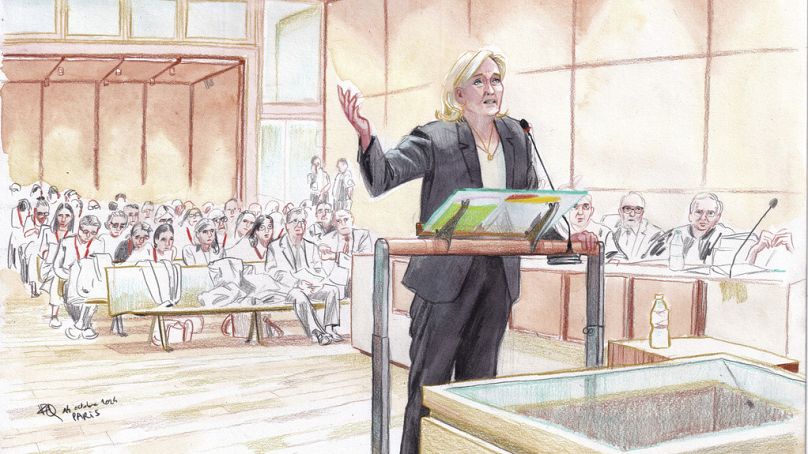 This courtroom sketch shows French far-right leader Marine Le Pen during his trial, facing court on charges of embezzling EU funds in Paris, France, Monday, Oct. 14, 2024