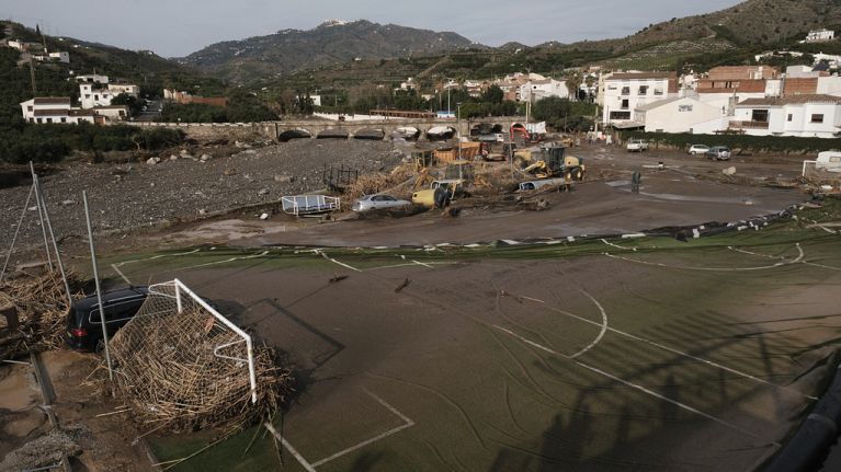 Vehicles are swept away by the floodwaters after the floods in Benagarmosa, Malaga, Spain, Thursday, Nov. 14, 2024. 