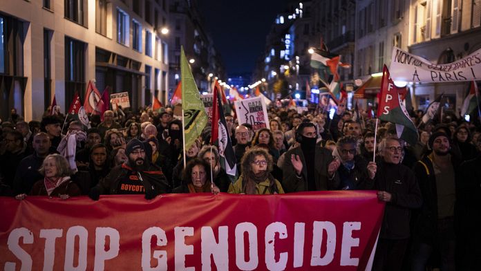 Thousands of protesters march in Paris ahead of tense football match between France-Israel