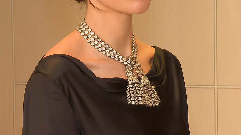 A model wearing the 18th century 300 carat diamond jewel necklace at a press viewing in London 