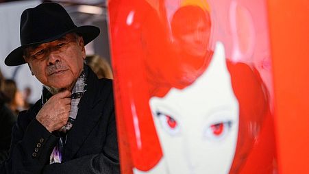 Artist Yoshitaka Amano poses during the press preview of the exhibition "Amano Corpus Animae"