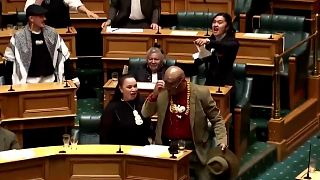 Watch: Maori mps stage haka protest over treaty bill