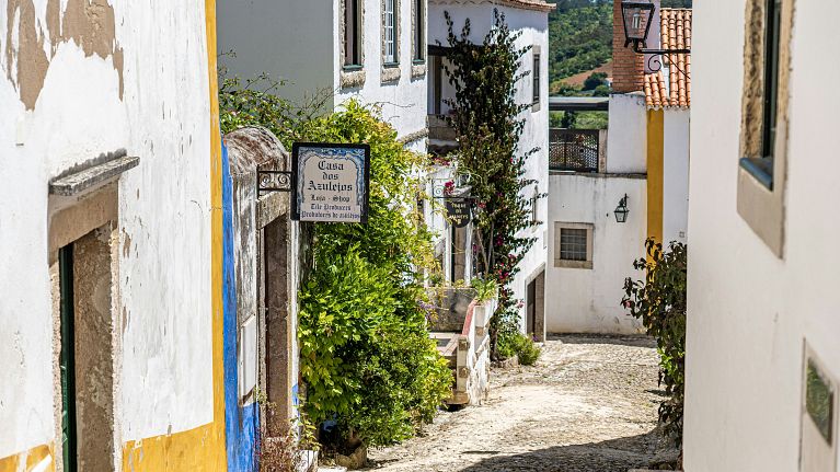 Located 80 kilometres north of Lisbon, Óbidos is a medieval village encircled by formidable high walls.