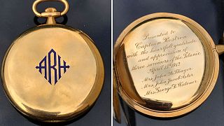 A gold pocket watch given to the captain who rescued Titanic survivors sells for record price 