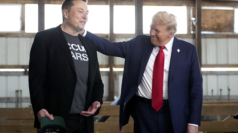 FILE - Tesla and SpaceX CEO Elon Musk, left, and Donald Trump, right, in October.