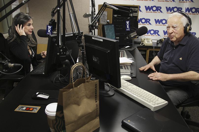 Arthur Frommer, 83, and his daughter, Pauline Frommer, 46, prepare for their radio show at the WOR studios in New York, May 20, 2012. 