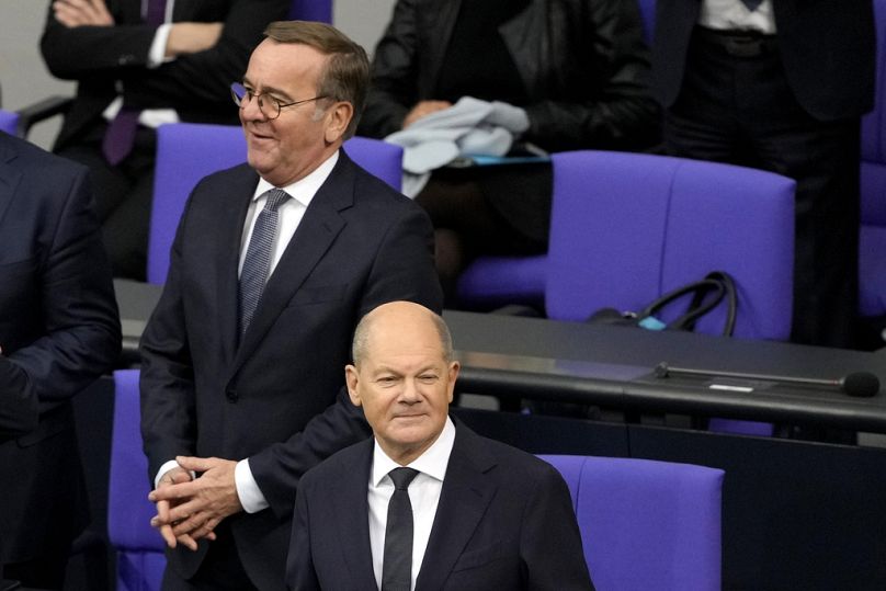 German Chancellor Olaf Scholz, right, and defence minister Boris Pistorius attend a plenary session in the German parliament Bundestag in Berlin, Germany, 2024.