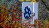 A Volkswagen logo of a car dealer is pictured in Neu-Anspach near Frankfurt, Germany, Wednesday, Oct. 30, 2024. (AP Photo/Michael Probst)