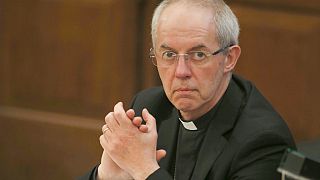 Archbishop of Canterbury will end official duties in early January amid sex abuse scandal