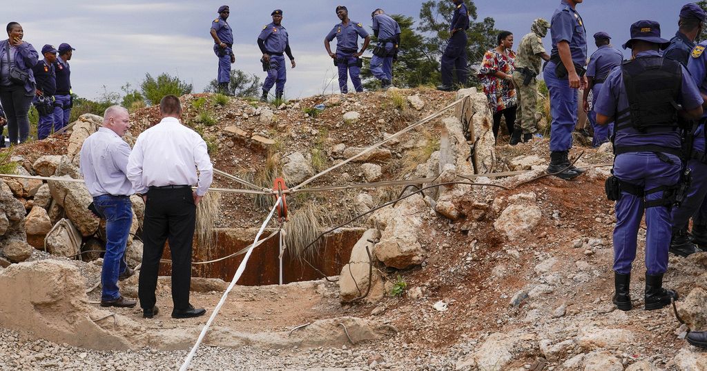 What to know about a standoff between police and illegal miners at a South Africa mine