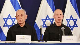 Israeli Prime Minister Benjamin Netanyahu, left and Defense Minister Yoav Gallant attend a press conference in the Kirya military base in Tel Aviv, Israel, Oct. 28, 2023.