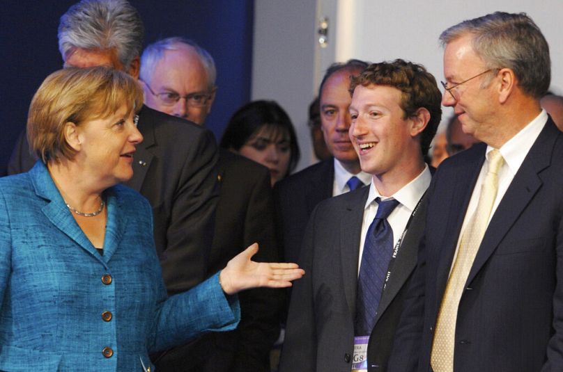 Angela Merkel, left, speaks with Google's Eric Schmidt, right, and Facebook founder Mark Zuckerberg, second right, during a round table meeting of G8 leaders, 2011.