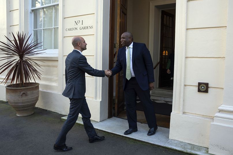 British Foreign Secretary David Lammy, right, shakes hands with his French counterpart Jean-Noël Barrot at Carlton House in London, 22 November, 2024