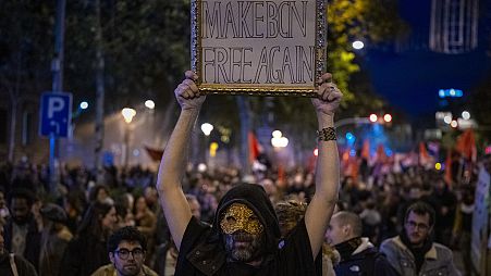 Demonstrators march to protest the skyrocketing cost of renting an apartment in Barcelona, Spain, Saturday, Nov. 23, 2024. 