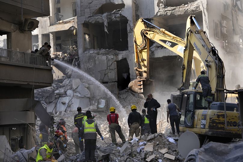 Rescue teams working on the site of an Israeli air strike in Beirut, 23 November, 2024