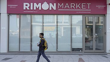 A man walks past Rimon Market, a Kosher grocery store managed by the late Rabbi Zvi Kogan, in Dubai, United Arab Emirates, Sunday, Nov. 24, 2024. 