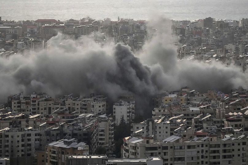 Smoke rises from Israeli air strikes in the Beirut suburb of Dahiyeh, 24 November, 2024