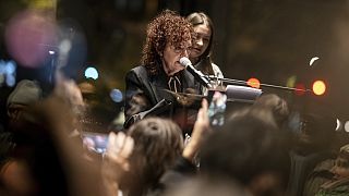 Nan Goldin speaks at the opening of her exhibition "Nan Goldin. This Will Not End Well" at the Neue Nationalgalerie museum in Berlin , Friday, Nov. 22. 2024.