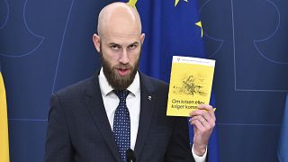 Sweden's Minister for Civil Defence Carl-Oskar Bohlin presents the new version of the booklet "If Crisis or War Comes" in Stockholm, Sweden, Tuesday Oct. 8, 2024.