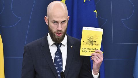 Sweden's Minister for Civil Defence Carl-Oskar Bohlin presents the new version of the booklet "If Crisis or War Comes" in Stockholm, Sweden, Tuesday Oct. 8, 2024.