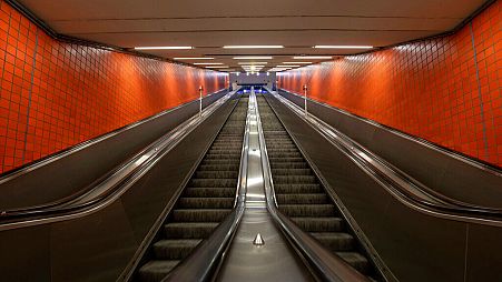 The escalators from the underground station to the arrivals hall at the main station are empty in the evening due to the coronavirus pandemic, Saturday, April 18, 2020.