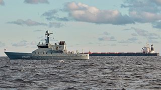 The Chinese cargo ship Yi Peng 3 is anchored and being monitored by a Danish naval patrol vessels in the sea of Kattegat Wednesday, Nov. 20, 2024.