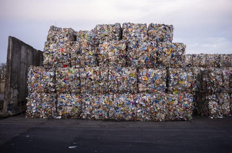 Plastic garbage bales stand at the courtyard of the Interzero plastic sorting facility in Berlin, Germany.