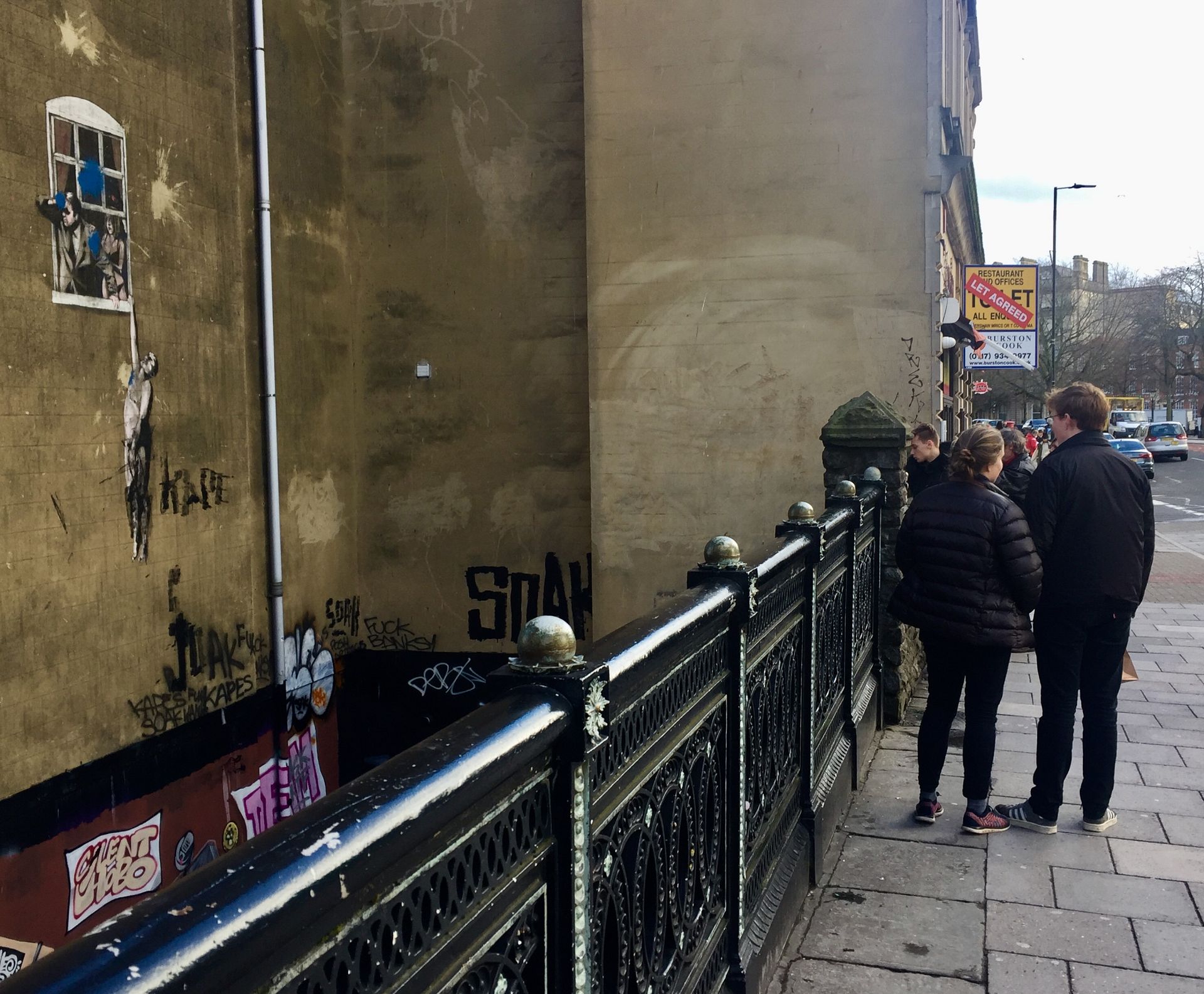 Banksy’s Well Hung Lover mural to be sold with Bristol building it’s ...