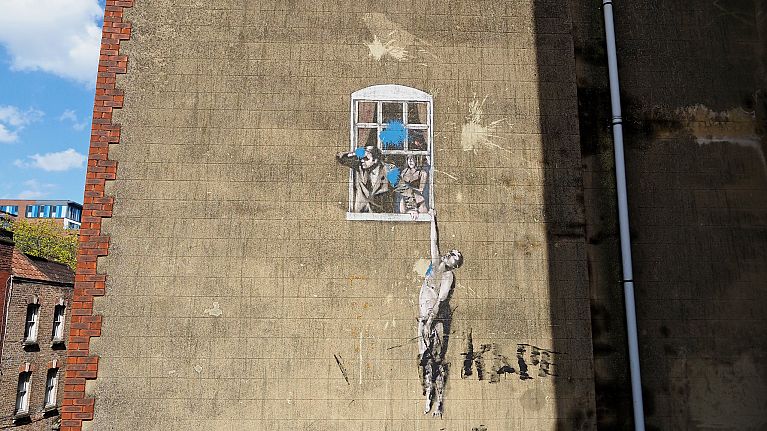 Banksy's "Well Hung Lover"
