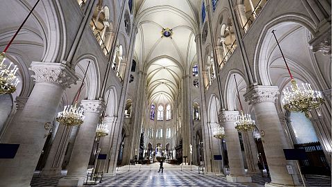 The nave of Notre-Dame de Paris cathedral is seen while French President Emmanuel Macron visits the restored interiors of the cathedral, Friday Nov. 29, 2024, in Paris