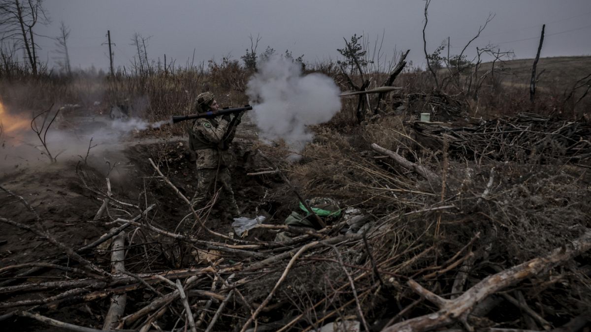 In this photo provided by Ukraine's 24th Mechanised Brigade press service, a serviceman of the 24th Mechanised Brigade improves his tactical skills at the training field in Do