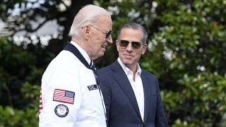 President Joe Biden walking with his son Hunter on the South Lawn of the White House, 26 July, 2024
