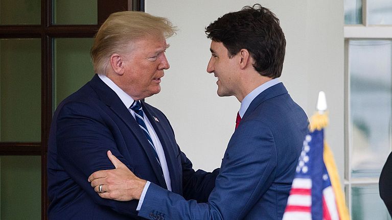 President Donald Trump greets Canadian Prime Minister Justin Trudeau upon his arrival at the White House, 20 June 2019, in Washington. 
