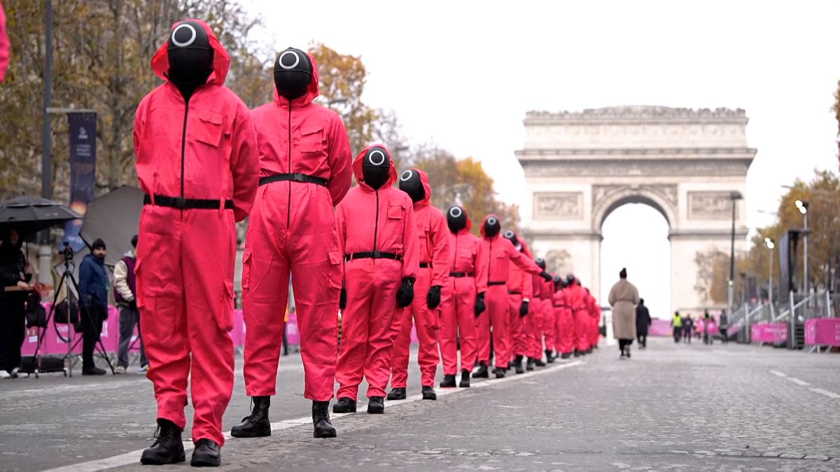 Squid Game fans bring 'Red Light, Green Light' to Paris's Champs-Elysées