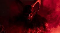 A participant dressed in a traditional Krampus costume on parade during the Krampus race in Hollabrunn, Austria, 30.11.2024