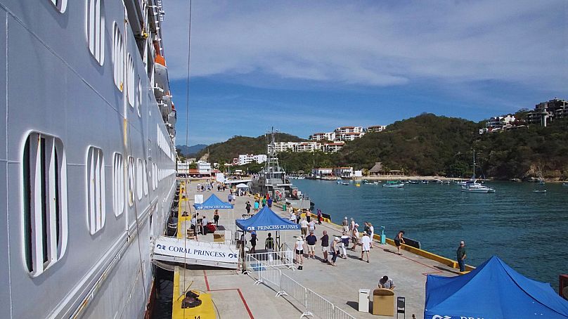 Passengers disembark their cruise ship in Mexico