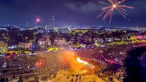 Bonfires and fireworks light up Reykjavík.