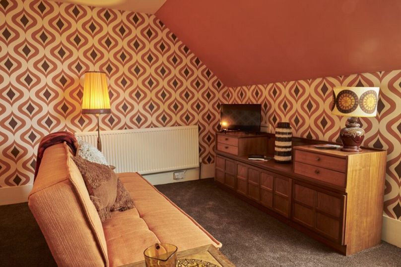 Period decor and furnishings add authenticity to the apartment.