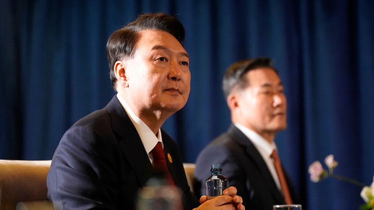 President of South Korea Yoon Suk Yeol listens during a trilateral meeting with President Joe Biden and the Prime Minister of Japan Shigeru Ishiba in Lima, Peru,Nov 2015.