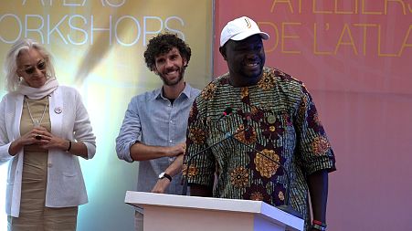 Senegalese director Moly Kane receiving an award for his film ‘Ici Repose’ as part of the Atlas Workshops in Marrakech, Morocco. 