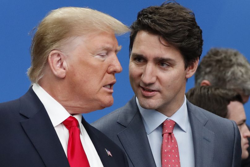 U.S. President Donald Trump, left, and Canadian Prime Minister Justin Trudeau talk prior to a NATO round table meeting in Watford, Hertfordshire, England, Dec. 4, 2019