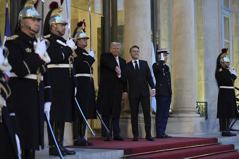 Trump y Macron en la recepción sobre la alfombra roja