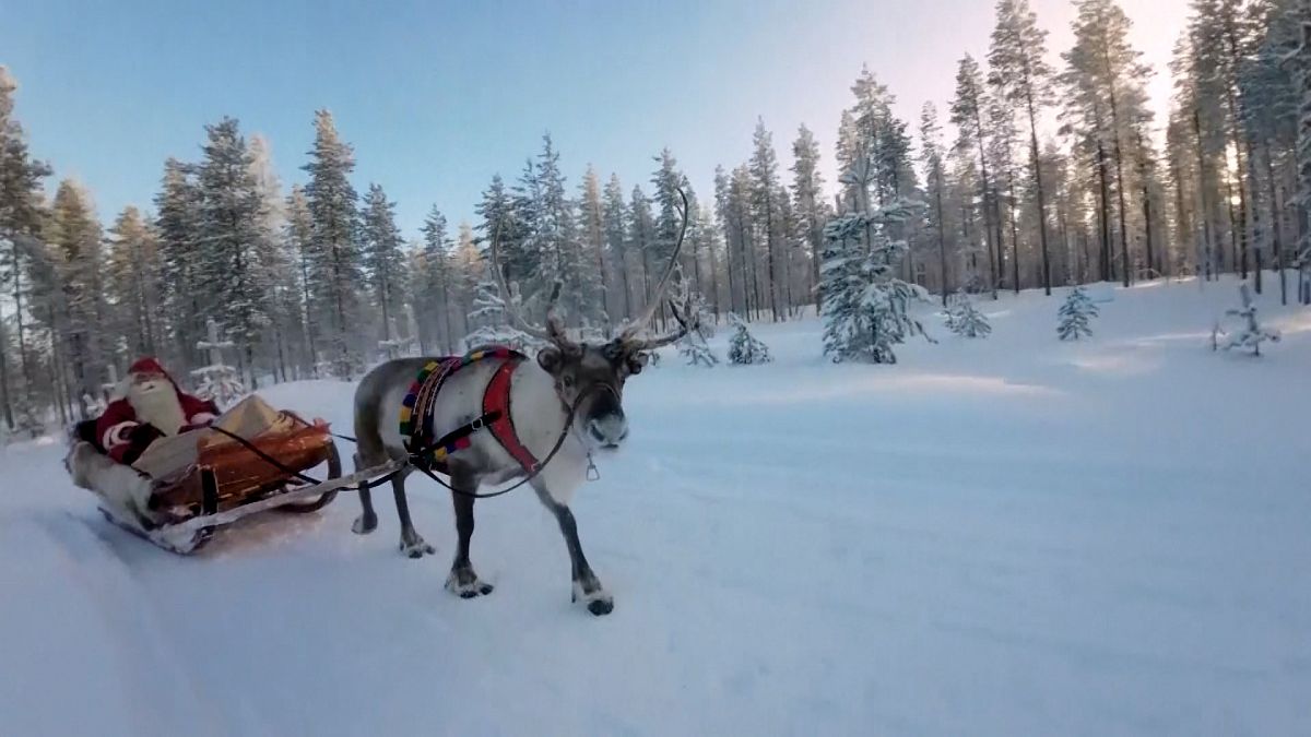 Warm autumn leaves Santa's Lapland village with less snow