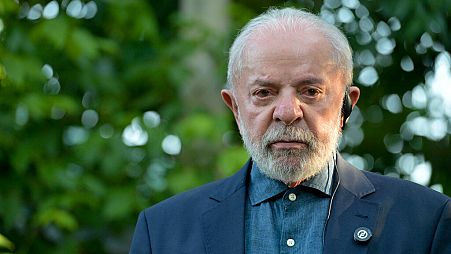 Brazil's President Luiz Inacio Lula da Silva stands outside Uruguayan former Jose "Pepe" Mujica's home during a visit, in Montevideo, Uruguay, Thursday, Dec. 5, 2024. 