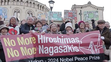 Japanese atomic bomb survivors in front of the Norwegian parliament, Oslo, Norway, 09.12.2024